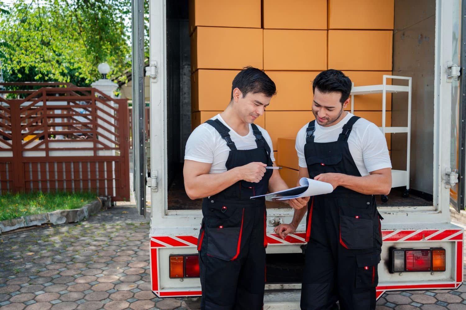 unloading-boxes-and-furniture-from-a-pickup-truck-2023-11-27-04-55-27-utc.jpg
